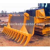 abrasion resistant root rake bucket for skid steer loader