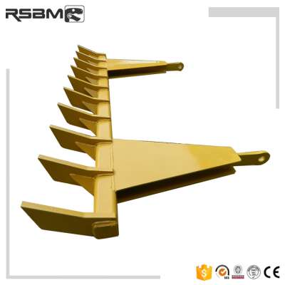 Wear resistant material dozer root rake and tractor root rake